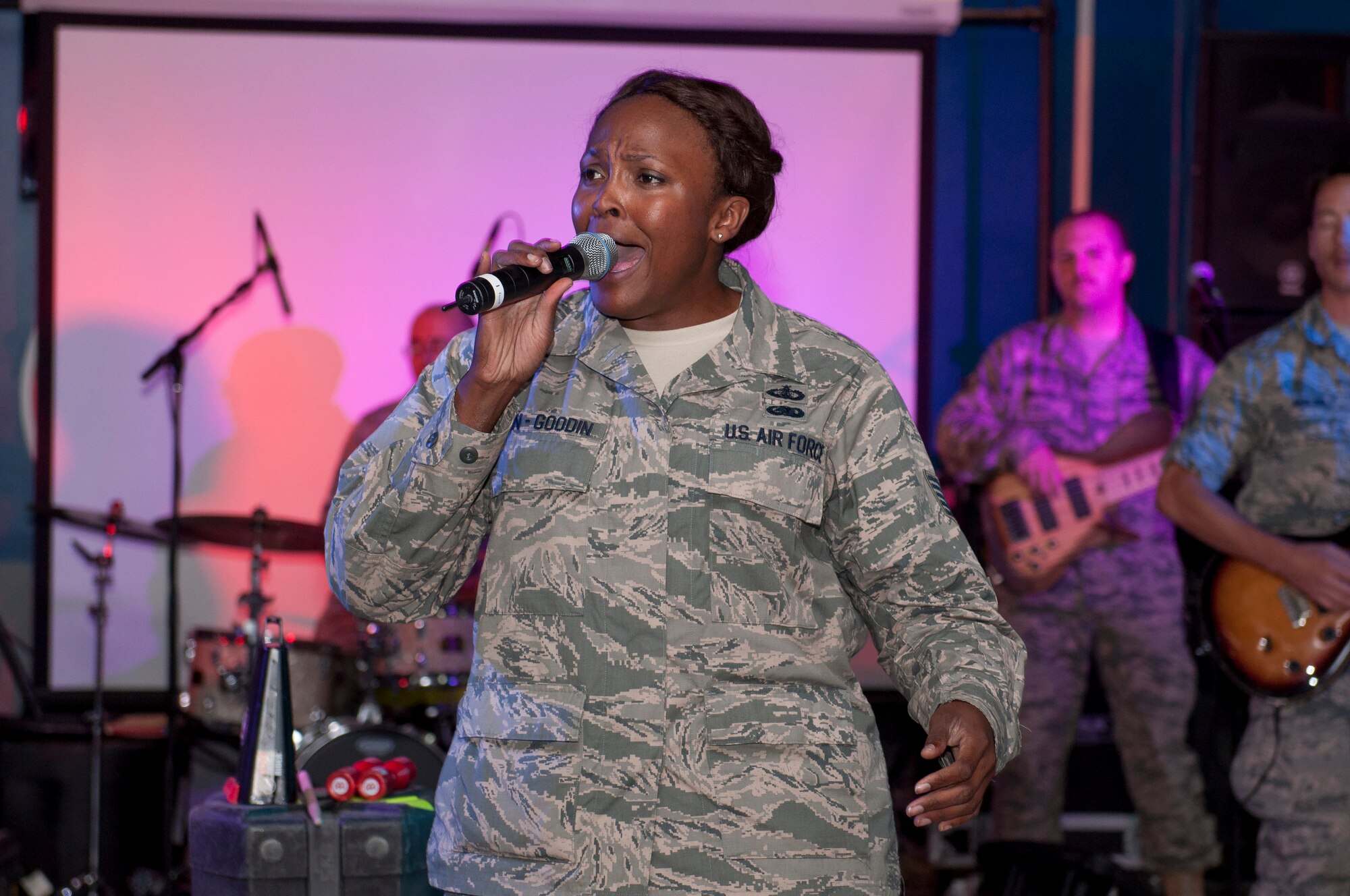 Tech. Sgt. Keisha Gwin-Goodwin, lead vocalist  with Starrlifter,  sings at the Drop Zone at The Rock June 17, 2014.  Starlifter is a seven-member group of talented musicians that performs in virtually every musical idiom and was here in support of Operation Enduring Freedom. (U.S. Air Force photo by Senior Master Sgt. Allison Day)