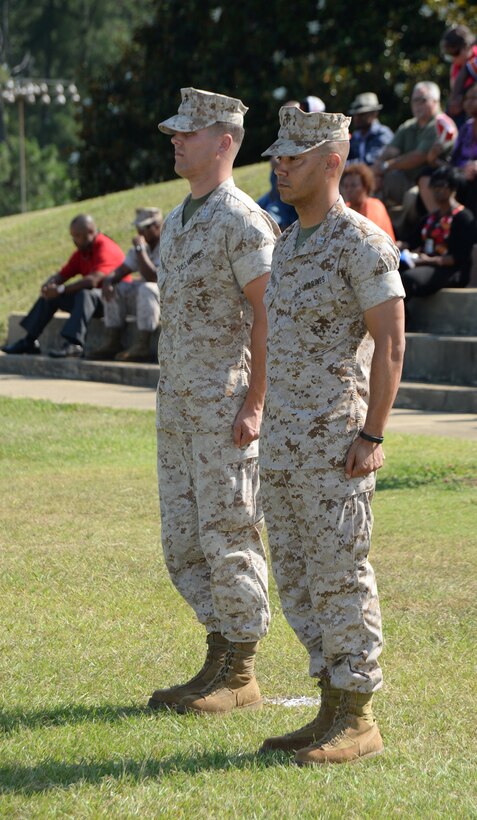 Capt. Justin Jacobs (left), former commanding officer of Headquarters and Support Company, Marine Corps Logistics Base Albany, stands with Capt. Kenneth Barber in front of the company’s Marines during the company change of command ceremony at Boyett Park, June 19. The ceremony signified Barber taking the company’s helm.