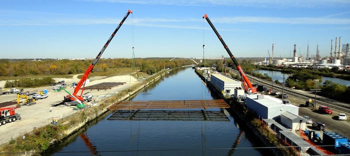 Underwater structures, known as parasitics, are placed into the Chicago Sanitary and Ship Canal as part of the electric barriers project in October 2010. The electric barriers deter the inter-basin establishment of Asian carp and other fish through an electric field in the water. Huntsville Center helps Army Corps of Engineers facilities like Chicago District's electric fish barriers - which are already using the best technology available for their specific operation - to find alternatives for reducing energy consumption. 