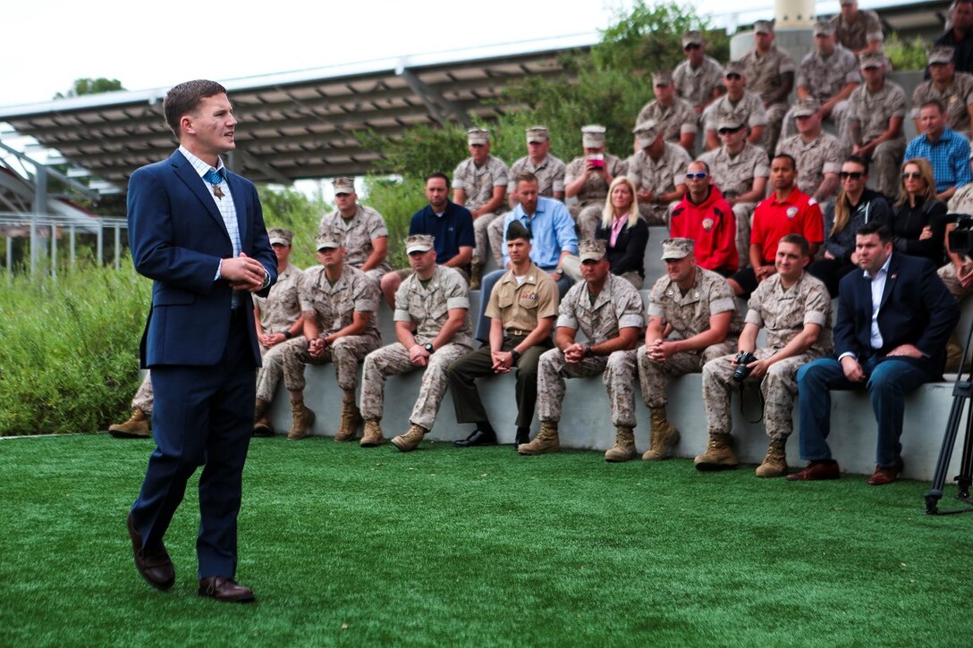 Medal of Honor recipient Cpl. William “Kyle” Carpenter addresses service members with Warrior Wounded Battalion West during a visit to Camp Pendleton, Calif., June 23, 2014. During the visit, Carpenter also spoke to service members at the base theater. Carpenter earned the nation’s highest military award for his actions in Helmand province, Afghanistan, in November 2010. He saved another Marine’s life by shielding him from a grenade blast during an enemy attack.