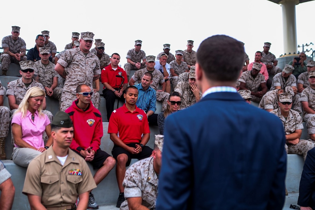 A Marine with Wounded Warrior Battalion West expresses his gratitude to Medal of Honor recipient Cpl. William “Kyle” Carpenter for visiting the battalion and imparting them with words of strength and motivation aboard Marine Corps Base Camp Pendleton, Calif., June 23, 2014. Carpenter earned the nation’s highest military award for his actions in Helmand province, Afghanistan, in November 2010. He saved another Marine’s life by shielding him from a grenade blast during an enemy attack.