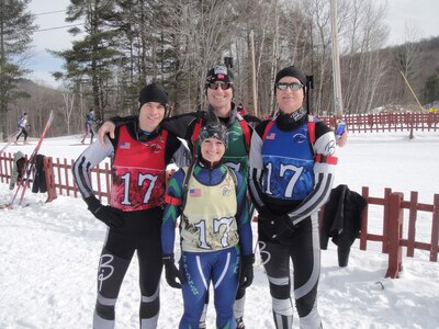 Together, Missouri National Guard's Staff Sgt. Tim Glavin, Sgt. Wayne Still, Chief Warrant Officer 2 Mitch Simpson, and 2nd Lt. Danielle Bean, of the Vermont National Guard, make up the patrol team race at the 2012 Chief of the National Guard Bureau Biathlon Championships at the Camp Ethan Allen Training Site, Vt. Feb. 29, 2012.