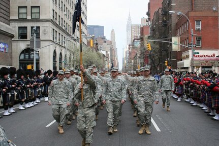 Soldiers and the colors of the New York Army National Guard's 1st Battalion, 69th Infantry, march down Lexington Avenue in the shadow of the Chrysler Building as they return to their state armory march 17, 2012. The battalion, famous as the "Fighting 69th" of the Civil War, World War I and World War II service, has led the New York City St. Patrick's Day parade for more than 160 years.