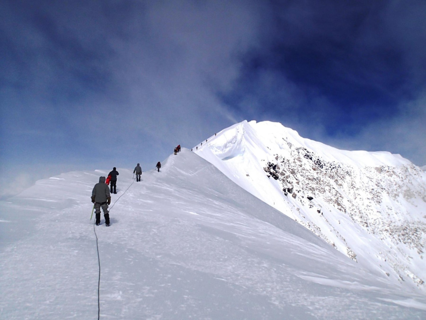 JOINT BASE ELMENDORF-RICHARDSON, Alaska (June 24, 2014) - The 4th Infantry Brigade Combat Team (Airborne), 25th Infantry Division, climb team, sponsored by U.S. Army Alaska, makes its way across Summit Ridge on Mount McKinley, June 15, 2014, at the Denali National Park and Preserve, Alaska. The team was there to demonstrate their arctic abilities and validate both their training and their equipment.  