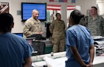 Army Command Sgt. Maj. Thomas Capel, senior enlisted adviser for ISAF and U.S. Forces-Afghanistan, visits with members of the emergency trauma staff at Craig Joint Theater Hospital in Bagram, March 19, 2012. Capel presented several members of the team, which include Soldiers from the Connecticut National Guard's 142nd Area Support Medical Company, with leadership coins and thanked them all for their hard work and dedication to saving Soldiers' lives.