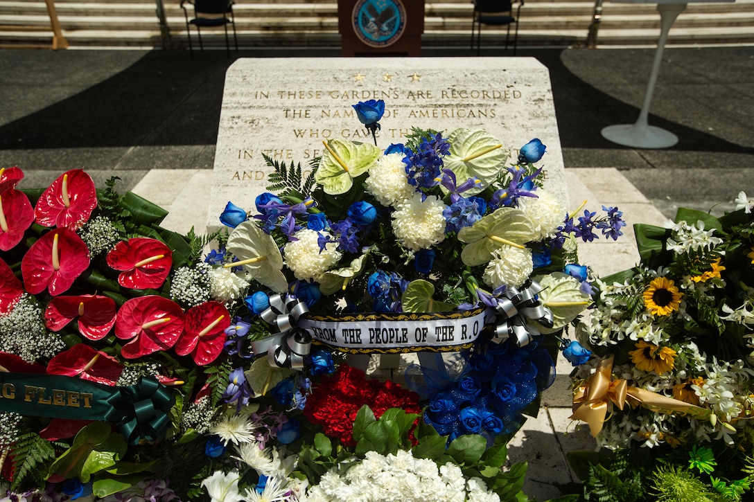 Wreaths rest at the base of the memorial at the National Memorial Cemetery of the Pacific (Punchbowl) at the conclusion of the 64th annual Korean War memorial ceremony, June 25, 2014. The ceremony commemorated U.S. and Republic of Korea veterans, both living and dead, who fought for the freedom of South Korea, and guests in attendance laid wreaths at the base of the memorial to honor those who gave their lives. (U.S. Marine Corps photo by Cpl. Matthew J. Bragg)