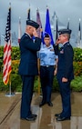 Col. David Kirkendall, 647th Air Base Group commander, and Col. Jeffrey Guimarin, 747th Communications Squadron commander, share a salute during a change of command ceremony at the Missing Man Formation on Joint Base Pearl Harbor-Hickam, Hawaii, June 26, 2014. During the ceremony, Guimarin took the reins from Lt. Col. David Hillman. (U.S. Air Force photo/Tech. Sgt. Terri Paden)