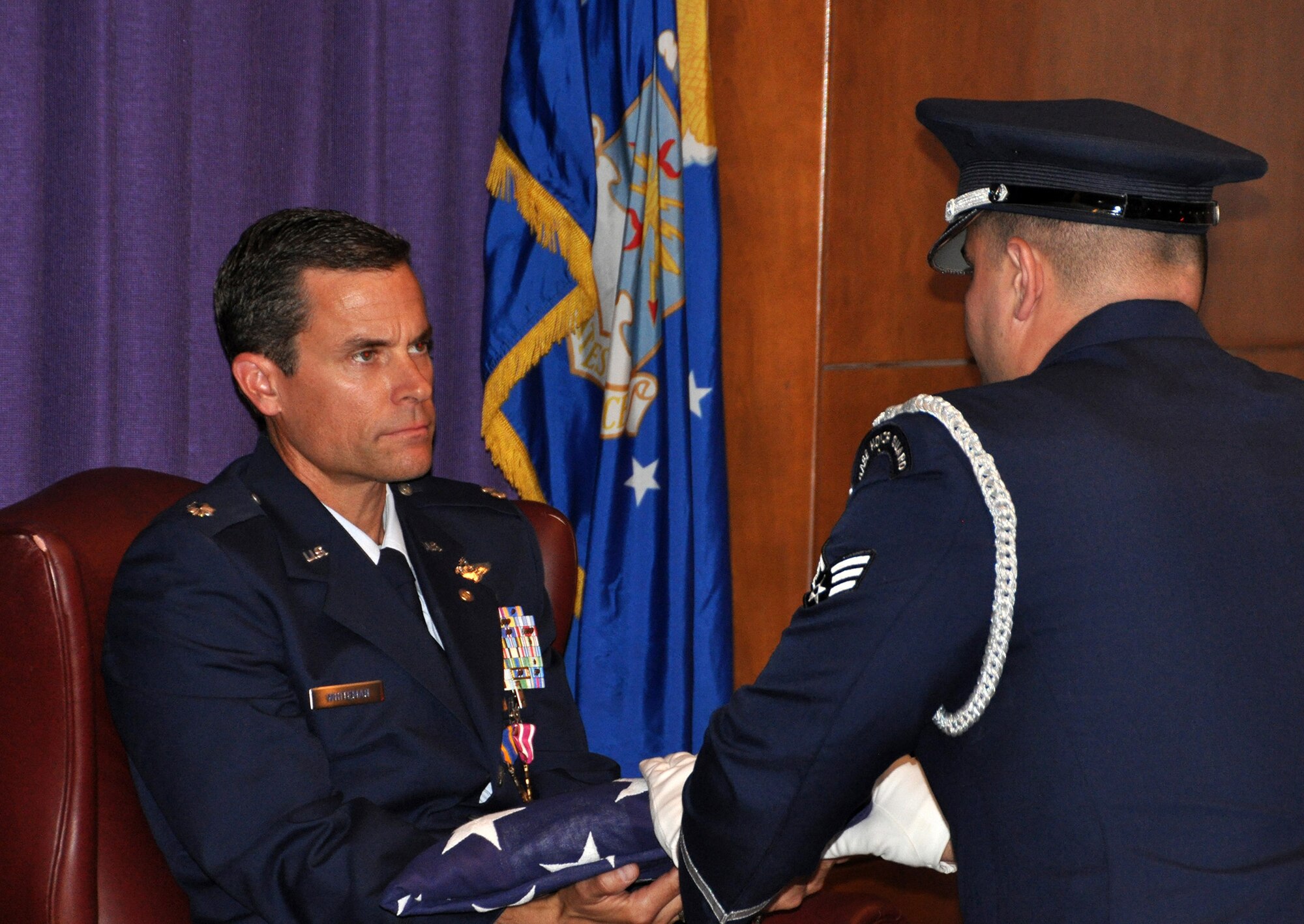 TRAVIS AIR FORCE BASE, Calif. -- Lt. Col. Jeffrey Whiteman, a KC-10 pilot with the 70th Air Refueling Squadron, retired after 26 years of service, June 21, 2014. During the retirement ceremony at Travis Air Force Base, Calif. (U.S. Air Force photos/Staff Sgt. Cindy G. Alejandrez)