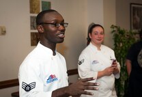 U.S. Air Force Senior Airman Arthur Williams, 23d Force Support Squadron food services specialist, gives an introduction before the start of a Man vs. Food competition at Moody Air Force Base, Ga., June 25, 2014. This was the first Man vs. Food competition the base has ever hosted. (U.S. Air Force photo by Senior Airman Jarrod Grammel/Released)
