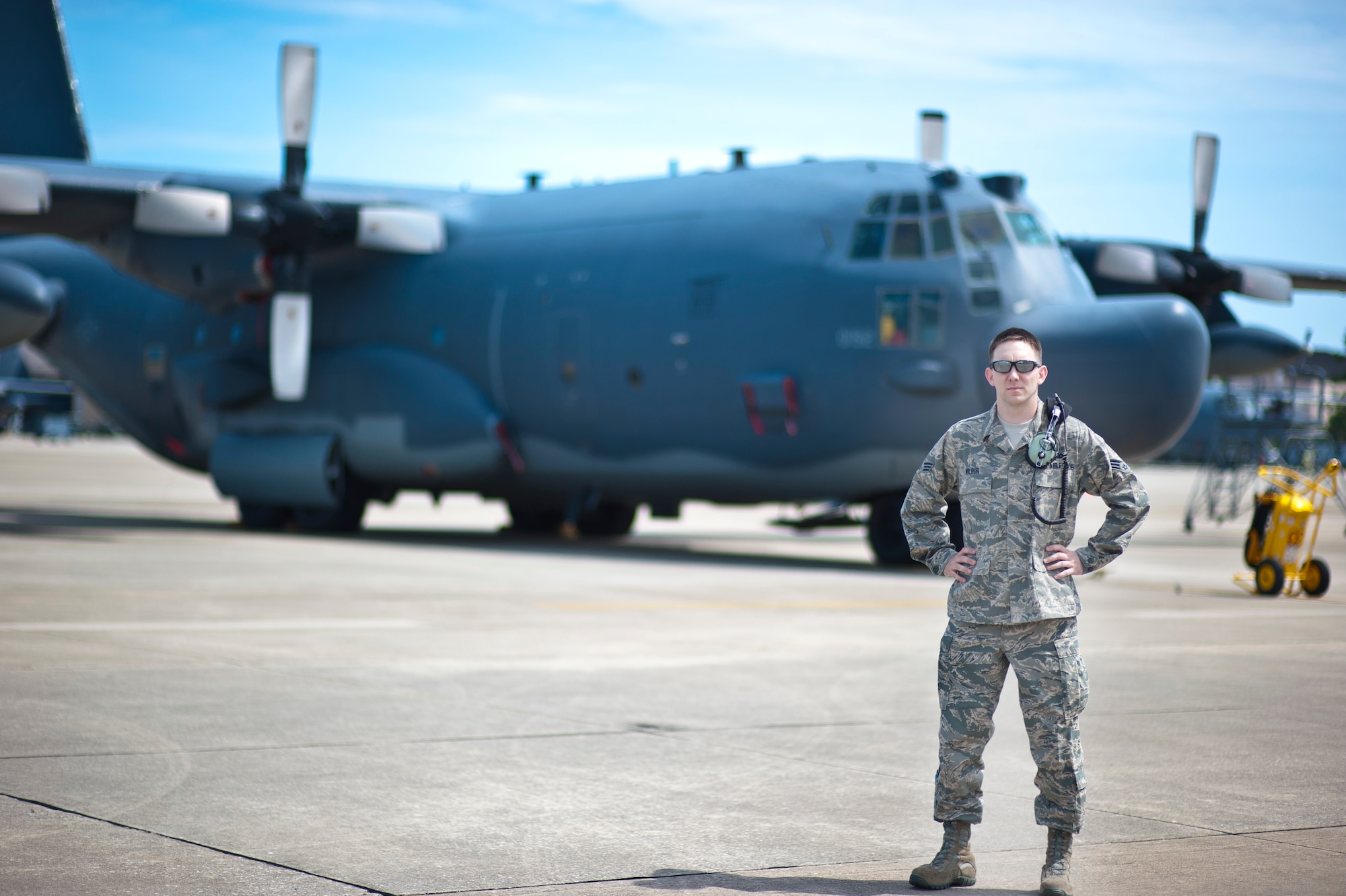 Senior Airman John Wilbur, 901st Special Operations Maintenance Squadron avionics journeyman, poses for a photo in front of a MC-130H Talon II on the flightline at Hurlburt Field, Fla., June 25, 2014. Wilbur was recently accepted for the Nursing Enlisted Commissioning Program. (U.S. Air Force photo/Senior Airman Krystal M. Garrett) 