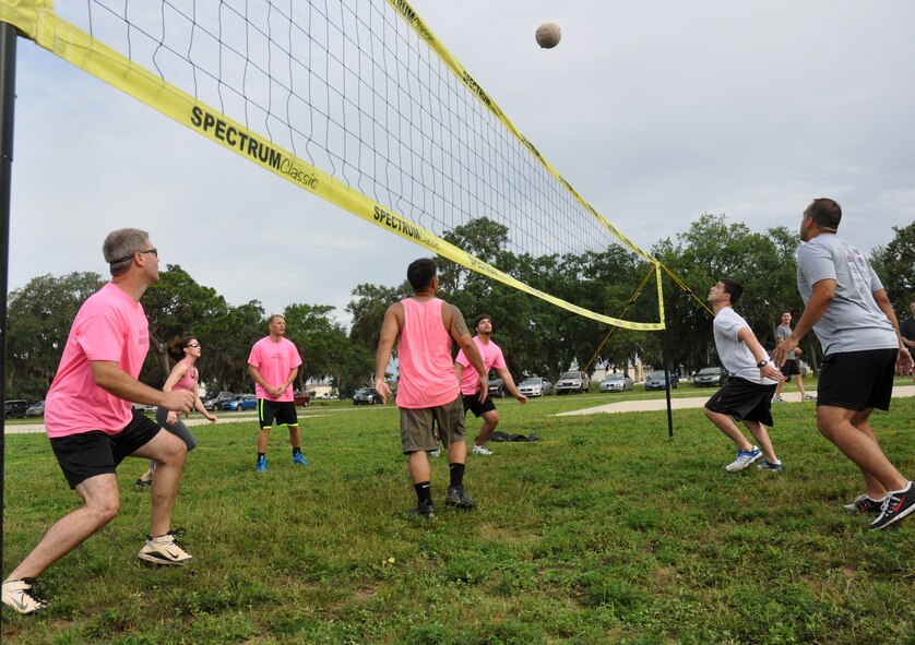 Airmen from the Armament Directorate participate in volleyball during their unit's field day event June 26 at Eglin Air Force Base, Fla. Their goal is to have approximately 100 personnel get together for morale building events quarterly. The directorate, a tenant unit here, is charged with enhancing worldwide Air Force combat capability and effectiveness through joint development, test, procurement, deployment and product sustainment support for air delivered weapon systems. (U.S. Air Force Photo/Ilka Cole)