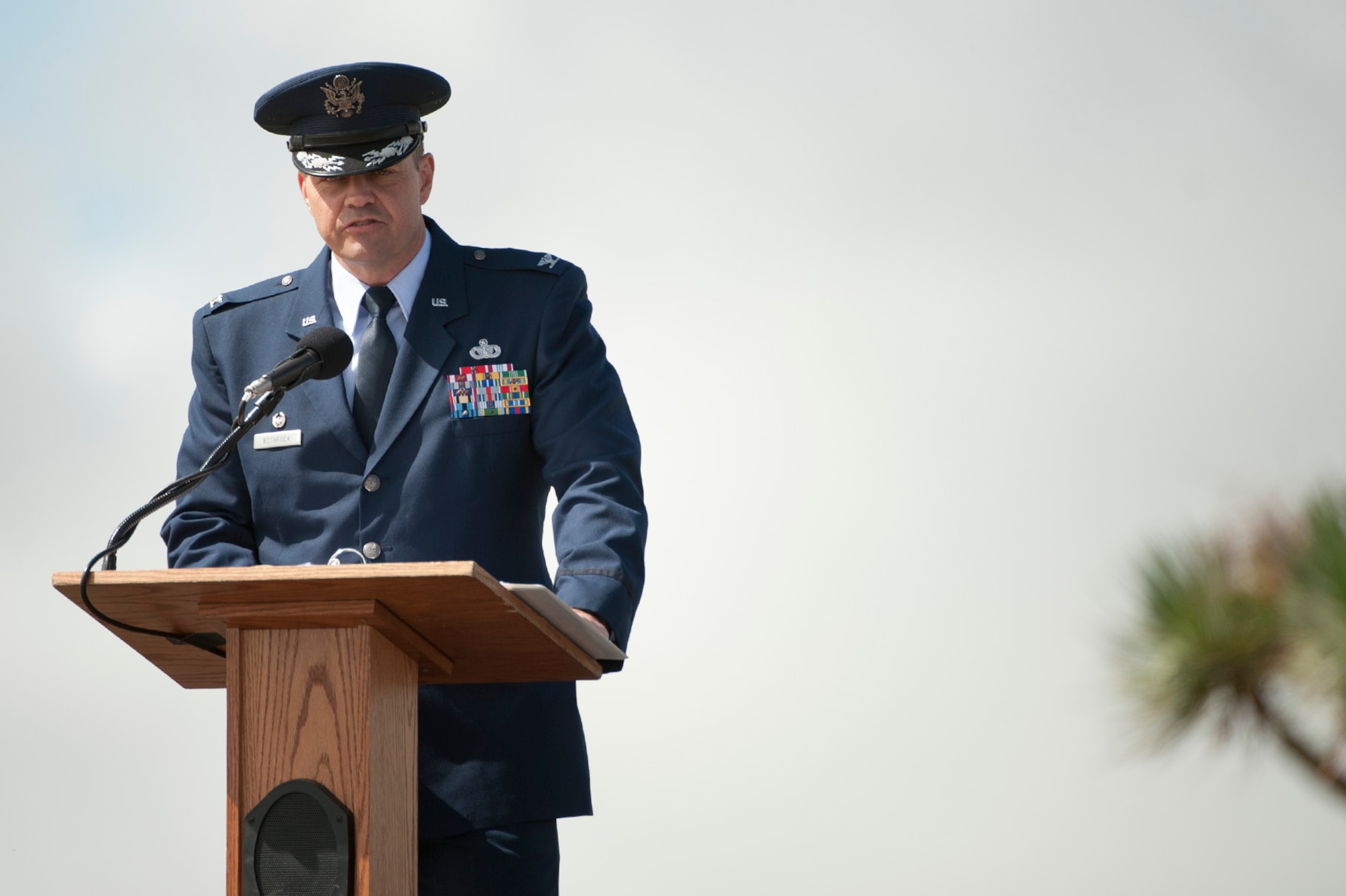 U.S. Air Force Col. Martin Rothrock, 65th Air Base Wing commander, speaks during the wing change of command ceremony June 26, 2014, Lajes Field, Azores, Portugal. Rothrock assumed command from Col. Chris Bargery, who had commanded the 65th ABW since July 2012.  Rothrock is a career security forces officer and arrives at Lajes Field from United States Forces in Korea.  (U.S. Air Force photo by Tech. Sgt. Paul Villanueva II/Released)