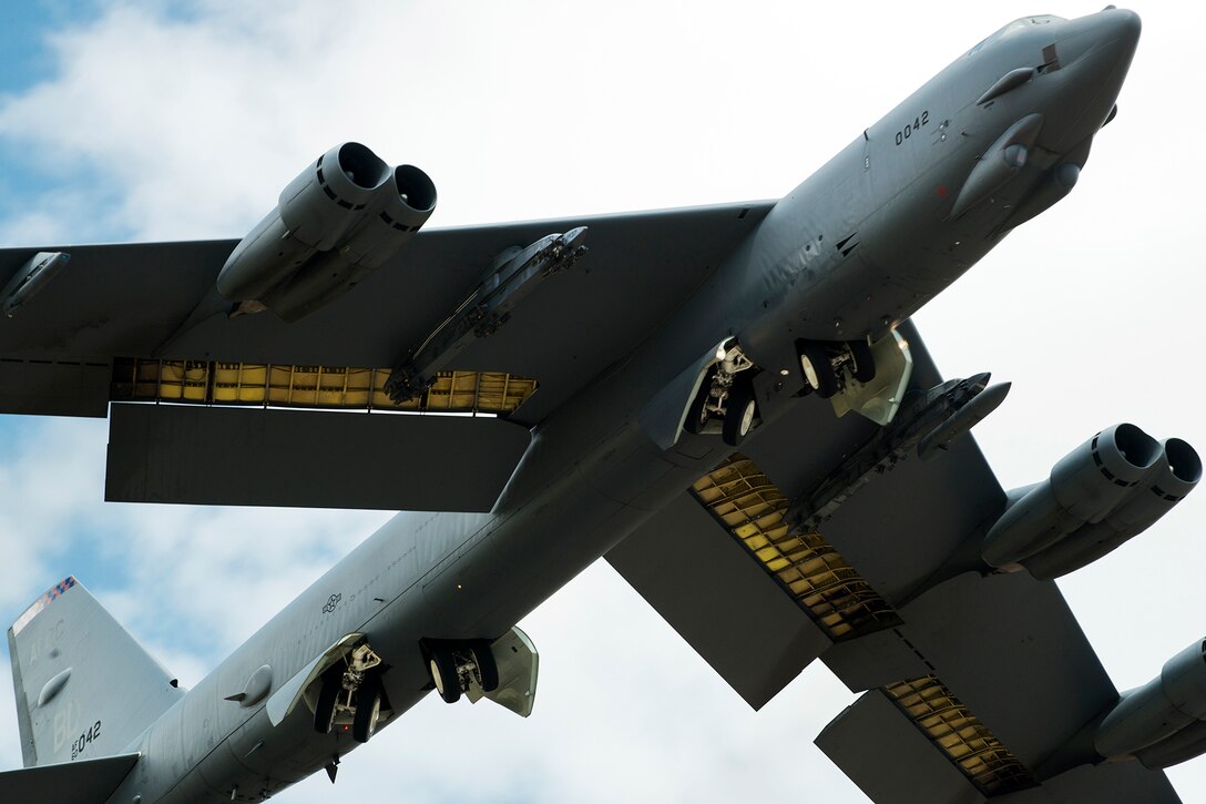 A 307th Bomb Wing B-52H Stratofortress takes flight on its first mission carrying the AN/ASQ-236 Radar Pod, April 21, 2014, Barksdale Air Force Base, La. The 307th Bomb Wing is testing the pod, which will give B-52s the ability to precisely geo-locate points of interest and conduct surveillance activities day or night, in adverse weather conditions. (U.S. Air Force photo by Master Sgt. Greg Steele/Released)