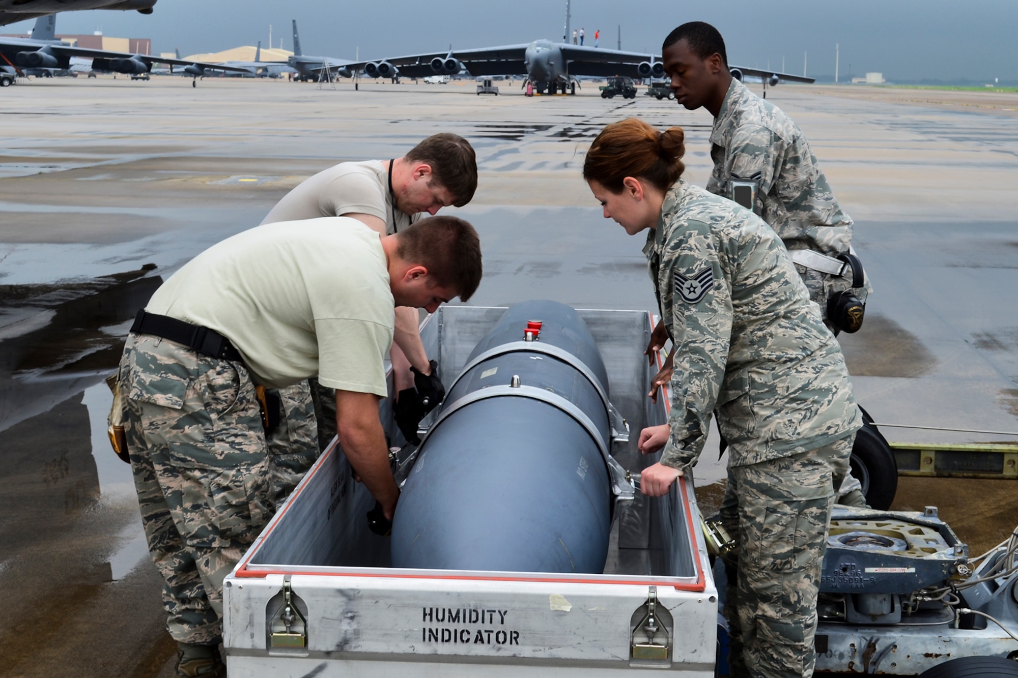 Weapons technicians assigned to the 2nd Aircraft Maintenance Squadron prepare an AN/ASQ-236 Radar Pod for loading onto a B-52H Stratofortress, April 14, 2014, Barksdale Air Force Base, Louisiana. The pod is operational on the F-15E Strike Eagle and is undergoing B-52 testing at Barksdale. (U.S. Air Force photo by Master Sgt. John Paxton/Released)