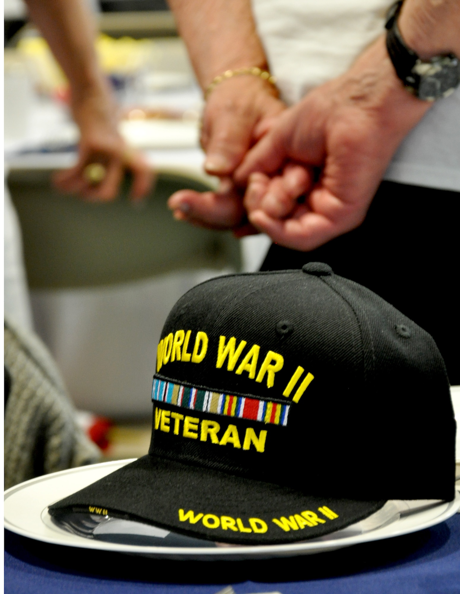 Honor Flight Philadelphia hosted a welcome reception and USO dinner to honor more than 150 World War II and Korean War veterans June 21, 2014, at St. Kevin’s Church, Springfield, Pa. Prior to the reception, the veterans were escorted, free of charge, to Washington D.C., and Arlington National Cemetery, Virginia, to visit their respective monuments and memorials. Upon their return, they were greeted by more than 700 people, including service members from Joint Base McGuire-Dix-Lakehurst, N.J. (U.S. Air Force photo by 2nd Lt. Carrie Volpe/Released)