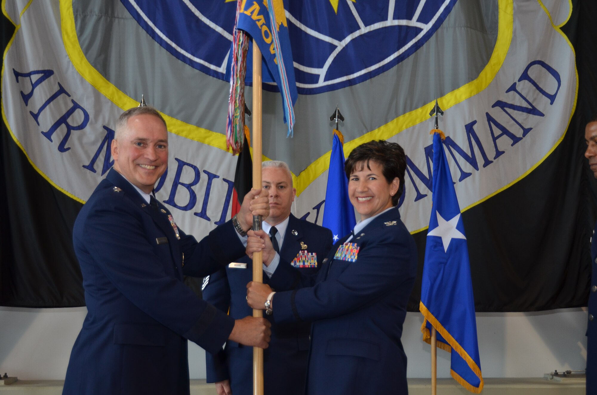 Col. Nancy Bozzer assumed command of the 521st Air Mobility Operations Wing during a ceremony here, June 18.  Maj. Gen Frederick “Rick” Martin, U.S. Air Force Expeditionary Center commander, officiated the ceremony. Before coming to Ramstein, Bozzer was the commander of the 100th Operations Group and the 401st Air Expeditionary Group at RAF Mildenhall, England.  (U.S. Air Force photo/ 2nd Lt. Clay Lancaster)