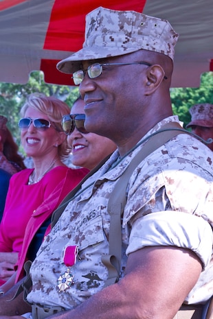 Col. Dwayne A. Whiteside (left), the outgoing commander of Combat Logistics Regiment 2, 2nd Marine Logistics Group, and Col. Brian N. Wolford, incoming commander of CLR-2, salute Marines  as they pass during the change of command ceremony for CLR-2 aboard Camp Lejeune, N.C., June 18, 2014.  Headquarters Company, General Support Motor Transportation Company, Combat Logistics Battalion 2 and Combat Logistics Battalion 6  were among the companies that attended the ceremony.