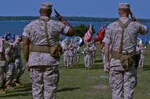 Col. Dwayne A. Whiteside (left), the outgoing commander of Combat Logistics Regiment 2, 2nd Marine Logistics Group, and Col. Brian N. Wolford, incoming commander of CLR-2, salute Marines  as they pass during the change of command ceremony for CLR-2 aboard Camp Lejeune, N.C., June 18, 2014.  Headquarters Company, General Support Motor Transportation Company, Combat Logistics Battalion 2 and Combat Logistics Battalion 6  were among the companies that attended the ceremony.