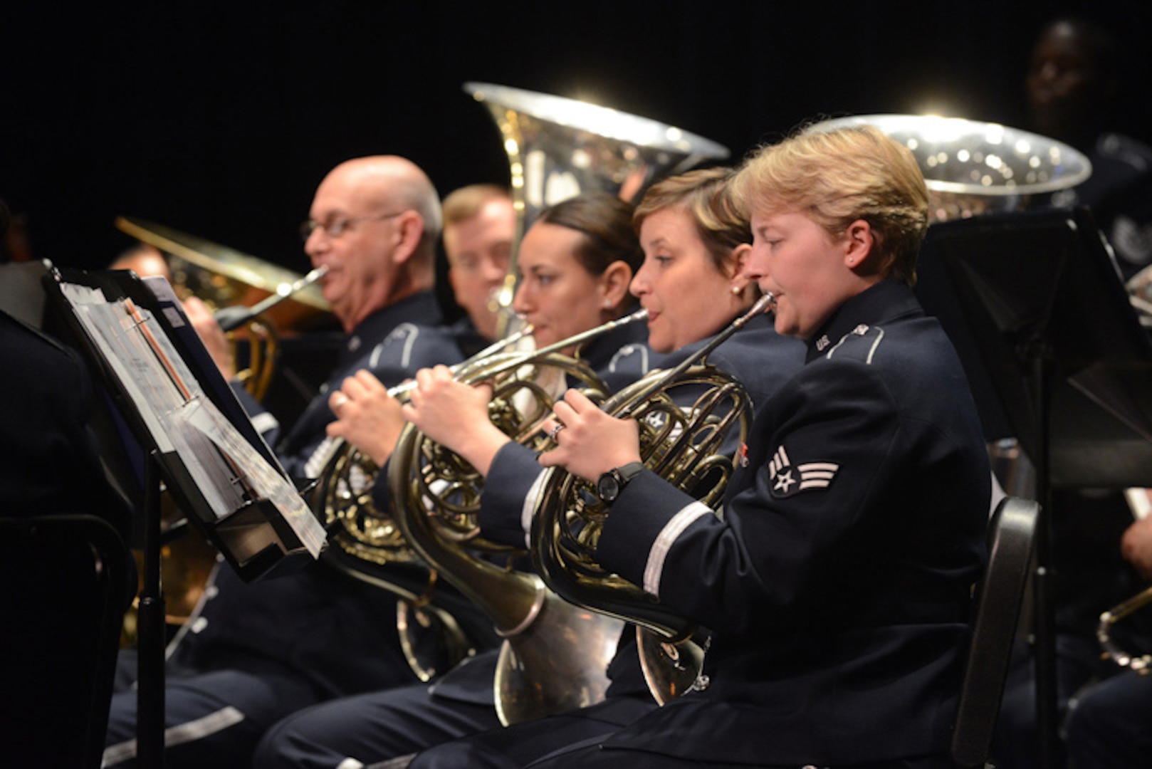Senior Airman Rayla Emminger, of the Air National Guard Band of the Southwest, performs in Bossier City, Louisiana, June 25, 2014. The Band of the Southwest is one of five regional bands that make up the Air National Guard Bands.  The Bands are scheduled to perform up to 60 shows this summer throughout the U.S. in order to maximize community outreach and tell the Air Guard story to the general public through music. (Air National Guard Bands photo)