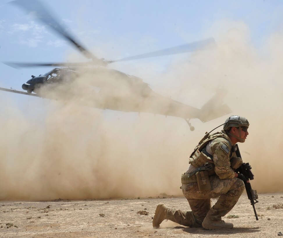 Senior Airman Sergio Verdin provides security during a training exercise with members of the 303rd Expeditionary Rescue Squadron and the French air force’s 311th Fighter Squadron June 12, 2014, in Djibouti. Verdin is a tactical air control party member with the 82nd ERQS. (U.S. Air Force photo/Tech. Sgt. Lakisha A. Croley)