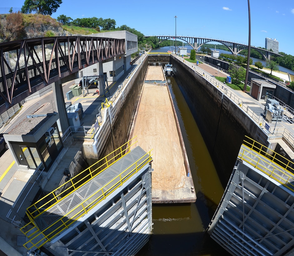 A downbound tow locks through Lock and Dam 1