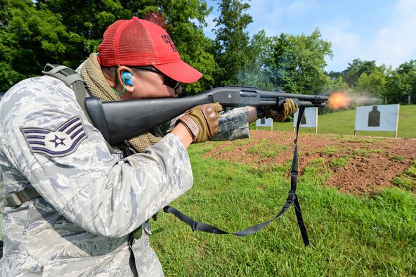 Staff Sgt. Hai Spletstoser fires a shotgun while training June 25, 2014, at the Catoosa Training Site, Tunnel Hill, Ga. The Georgia Air National Guard’s 116th Security Forces Squadron is the security arm of the 116th Air Control Wing, Robins Air Force Base, Ga. The squadron deployed to the Catoosa Training Site for annual training where they received extensive classroom and hands-on training to hone their skills on various firearms such as the M4 carbine, M203 grenade launcher and the M240 and M249 machine guns. Spletstoser is a combat arms instructor with the 116th SFS. (U.S. Air National Guard photo/Master Sgt. Roger Parsons)