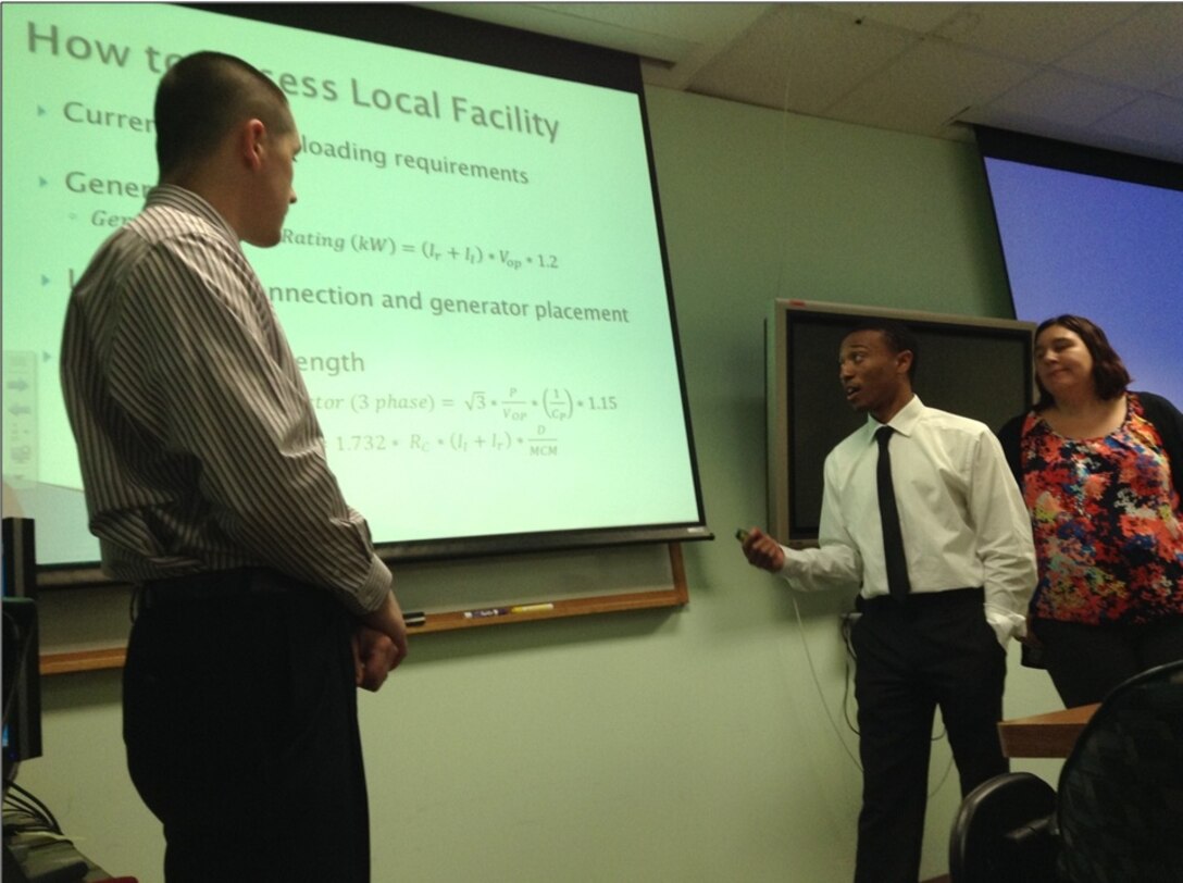 Old Dominion University seniors, Chance Rabun, Michael Chatman and Amanda Downs, brief ODU faculty and Corps advisory team on their final senior design report: the Emergency Power Needs for Critical Facilities project. David Gary, Norfolk District’s Mechanical and Electrical Section chief, said the final report was complete and comprehensive.