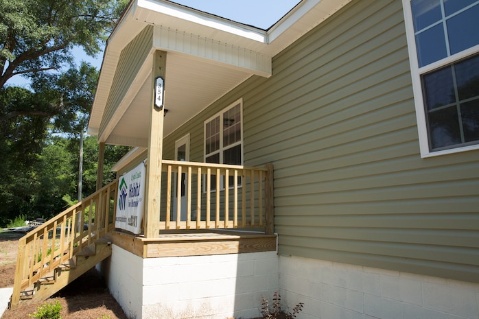 A home built by Marines with 8th Engineer Support Battalion, 2nd Marine Logistics Group and other volunteers waits to receive its new family in Newport, N.C., June 26, 2014.  Marines from Bravo Company, 8th ESB put up siding, painted and poured concrete to help build the four-bedroom, three-bathroom home.