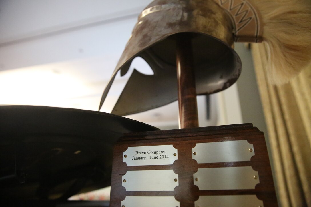 The inaugural Spartan Cup trophy stands displayed during Marine Wing Communications Squadron 28's mess night at Marine Corps Air Station Cherry Point, N.C., June 19, 2014. The Spartan Cup measured the physical fitness, fighting spirit and commitment to Marine Corps values within the squadron's three companies. Company B earned a place in the squadron's history as the first company to earn the Spartan Cup.
