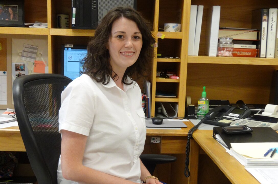 Amanda Keisling, an office assistant at the U.S. Army Corps of Engineers Nashville District’s Dale Hollow Power Plant in Celina, Tenn., works at her desk June 27, 2014.  She is the Employee of the Month for May 2014. 