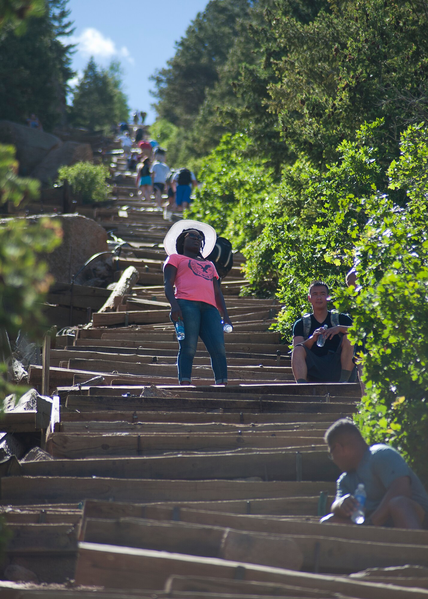 Senior Airman Duvina Jones, 714th Aircraft Maintenance Squadron, takes a break from hiking up the Manitou Incline, Manitou, Colorado, during an off-station training mission June 20. The mission included aerial refueling flights, aircraft maintenance and team building exercises. The Manitou Incline is a mile hike 2000 vertical feet up and ends with a view of the Colorado Springs, Colorado area from 8800 feet above sea-level.