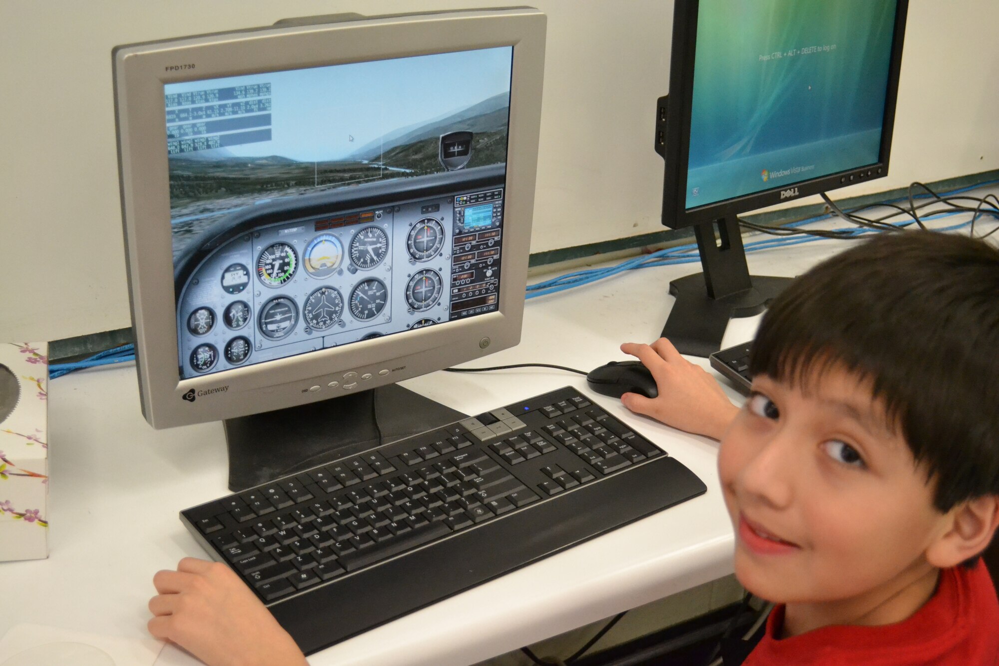 North Middle School student Armando Montez takes his turn at the flight simulator as part of the Fly to Learn STEM program.