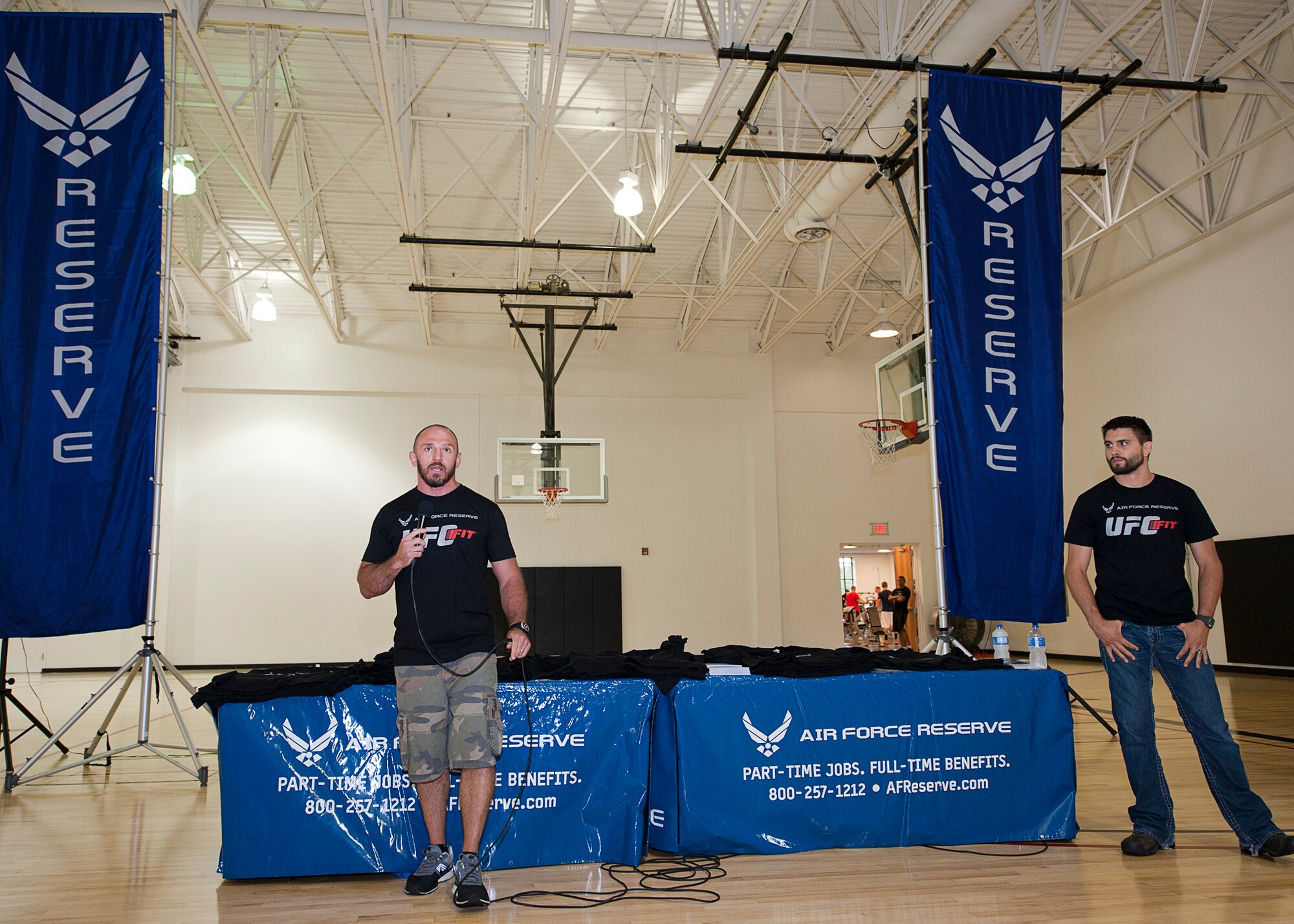 UFC Fit coach Mike Dolce speaks to a crowd at the Joint Base McGuire Dix Lakehurst Fitness Center, June 25, during an Air Force Recruiting sponsored fitness workshop. The workshop focused on improving fitness through setting goals, being accountable and proper diet. (U.S. Air Force photo/Christian DeLuca)
