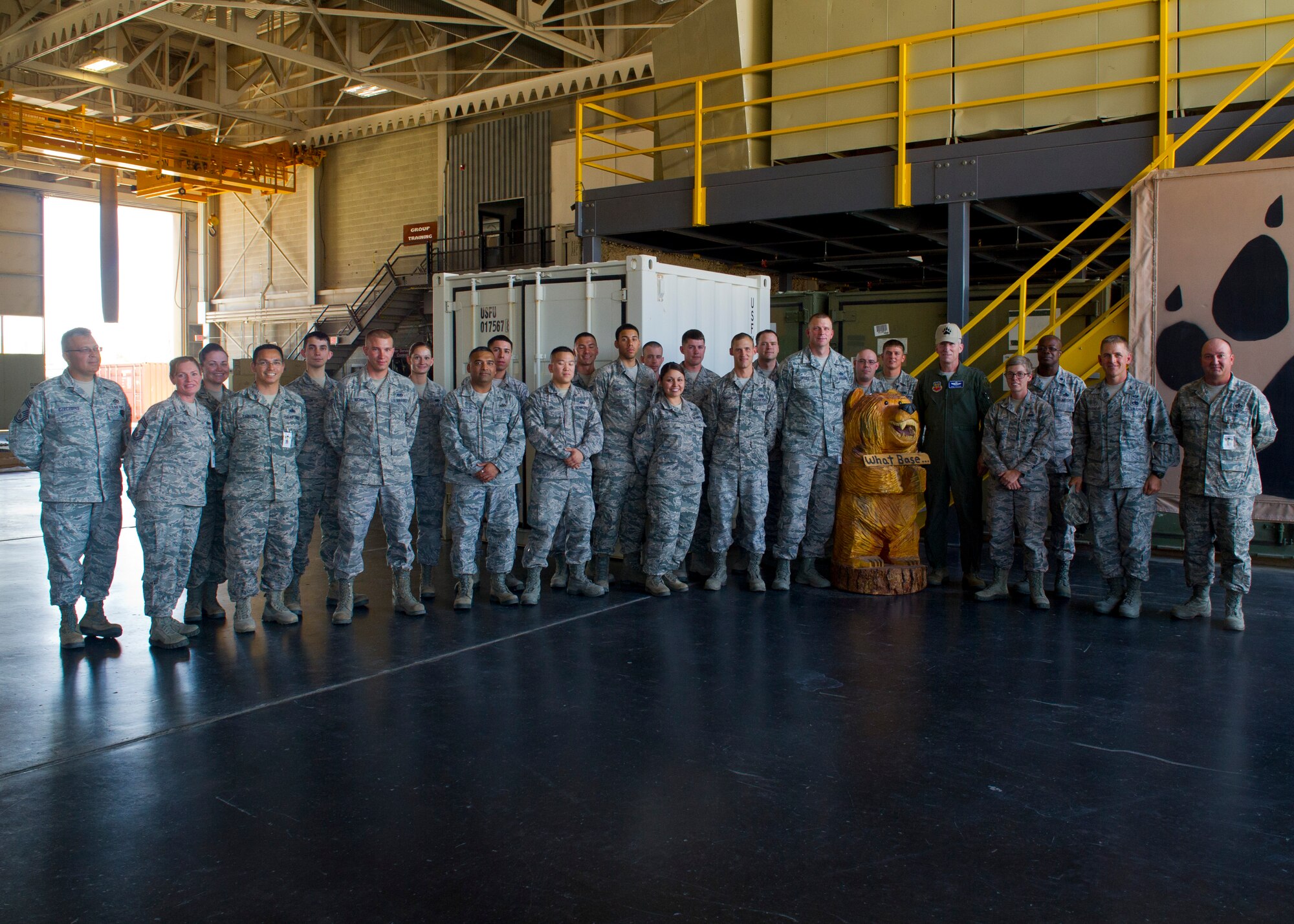 U.S. Air Force Gen. Mike Hostage, commander of Air Combat Command, takes a group photo with Airmen of the Material Maintenance Group during his tour at Holloman Air Force Base, N.M., June 25.  Hostage visited Holloman to observe the mission and speak with members of Team Holloman on important Air Force topics. (U.S. Air Force photo by Airman 1st Class Leah Ferrante/released) 