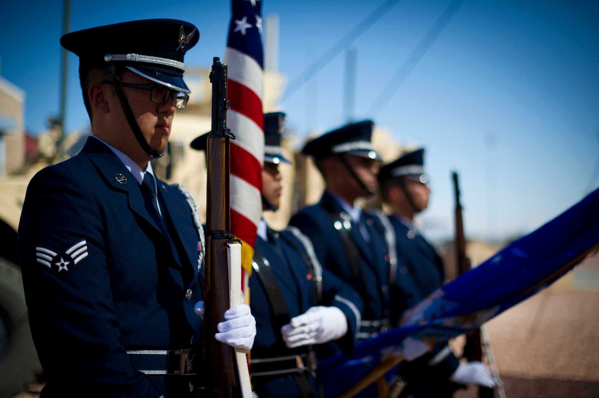 The Steel Talons Honor Guard presents the colors during the opening ceremony of the Ground Command Readiness Training Center and assumption of command at Fort Bliss, Texas, June 26. The GCRTC consolidated a regional training center for all the military police personnel from both Air Force and Army to use to conduct required pre-deployment training. (U.S. Air Force photo by Airman 1st Class Aaron Montoya / Released)