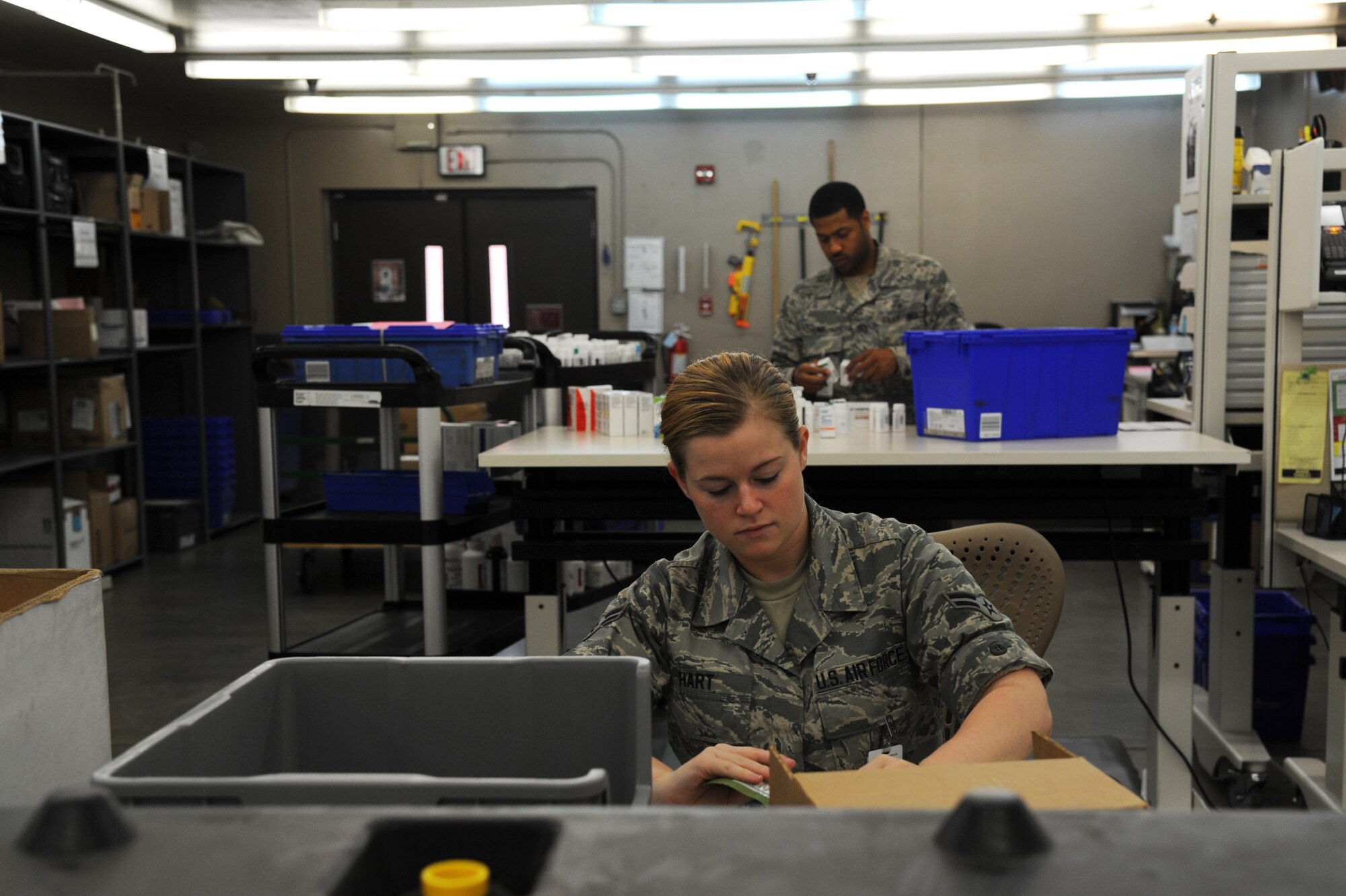 Airman 1st Class Brittany Hart, 19th Medical Support Squadron medical material technician, checks inventory June 19, 2014, at Little Rock Air Force Base, Ark. The medical logistics flight stores many items such as first aid kits used during deployments. (U.S. Air Force photo by Airman 1st Class Mercedes Muro) 