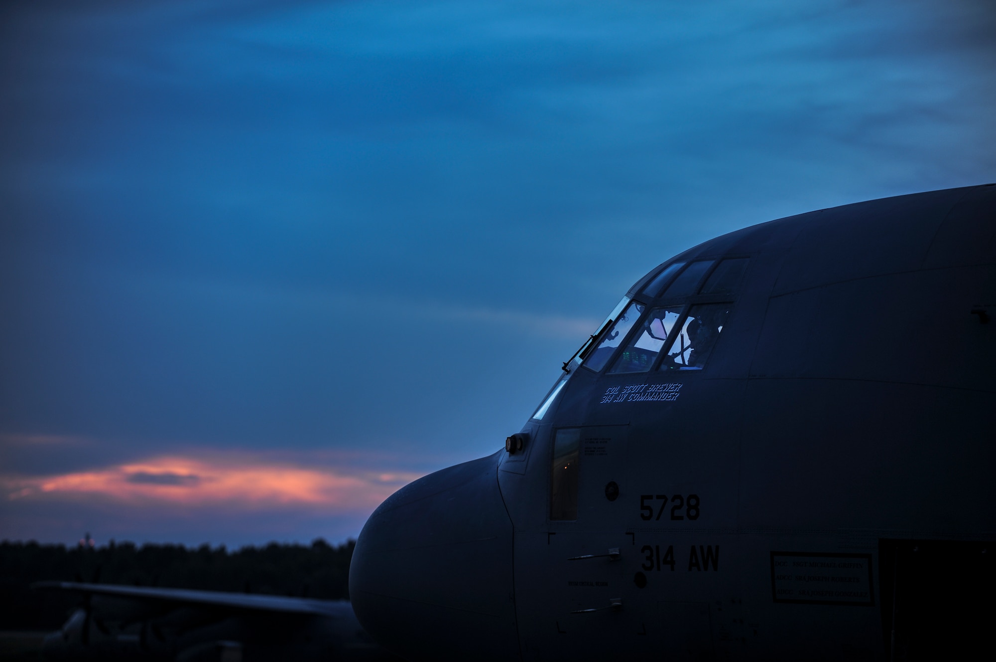 A pilot from the 314th Airlift Wing completes pre-flight checks on the 314th AW flagship C-130J June 20, 2014, at Little Rock Air Force Base, Ark. Team Little Rock is the home of C-130 combat airlift and the world’s largest C-130 fleet. (U.S. Air Force photo by Airman 1st Class Cliffton Dolezal) 