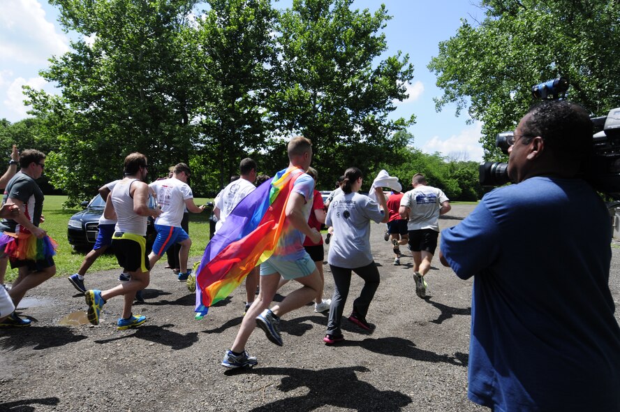 Participants in Wright-Patterson Air Force Base’s first Pride 5K Run & Walk take off from the start line back near the picnic shelter at Bass Lake June 28 (Photo by Cindy Holbrook).