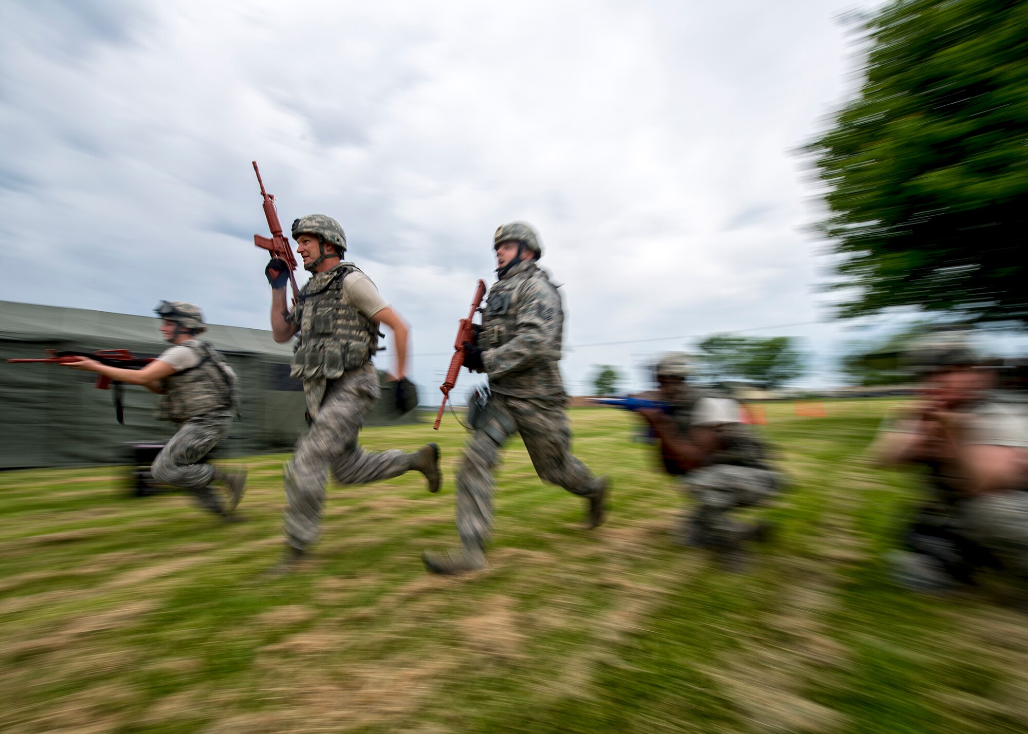 Members of the 914th Security Forces exchange best practices with local law enforcement officers during a weeklong weapons training exercise, June 8, 2014, Niagara Falls Air Reserve Station, N.Y. From global deployments to the ability to share specialized training with first responders; exercises like this are just one of the many ways the 914th Airlift wing contributes to the community. (U.S. Air Force photo by Tech. Sgt. Joseph McKee)