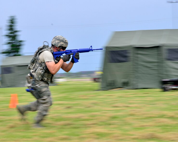 Members of the 914th Security Forces exchange best practices with local law enforcement officers during a weeklong weapons training exercise, June 8, 2014, Niagara Falls Air Reserve Station, N.Y. From global deployments to the ability to share specialized training with first responders; exercises like this are just one of the many ways the 914th Airlift wing contributes to the community. (U.S. Air Force photo by Tech. Sgt. Joseph McKee)