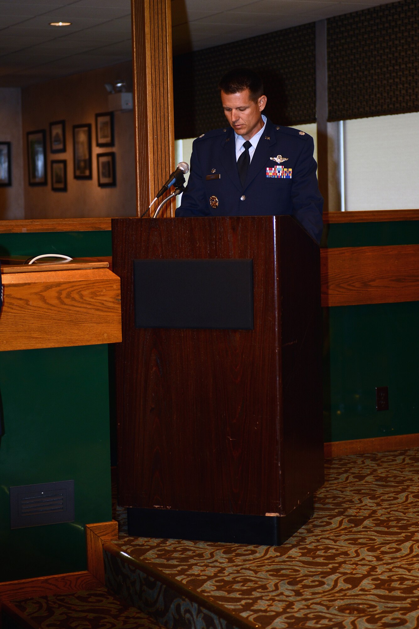 Lt. Col. Jason Scott, 361st Recruiting Squadron commander, addresses the Airmen of the 361st RCS after assuming command of the squadron June 26, 2014, at McChord Field’s Co-located Club at Joint Base Lewis-McChord, Wash. Scott joined the Air Force in 1996 as a graduate of the Air Forces ROTC program at Texas State University, San Marcos, Texas and has served in numerous leadership positions in his Air Force career. (U.S. Air Force photo/Airman 1st Class Jacob Jimenez) 
