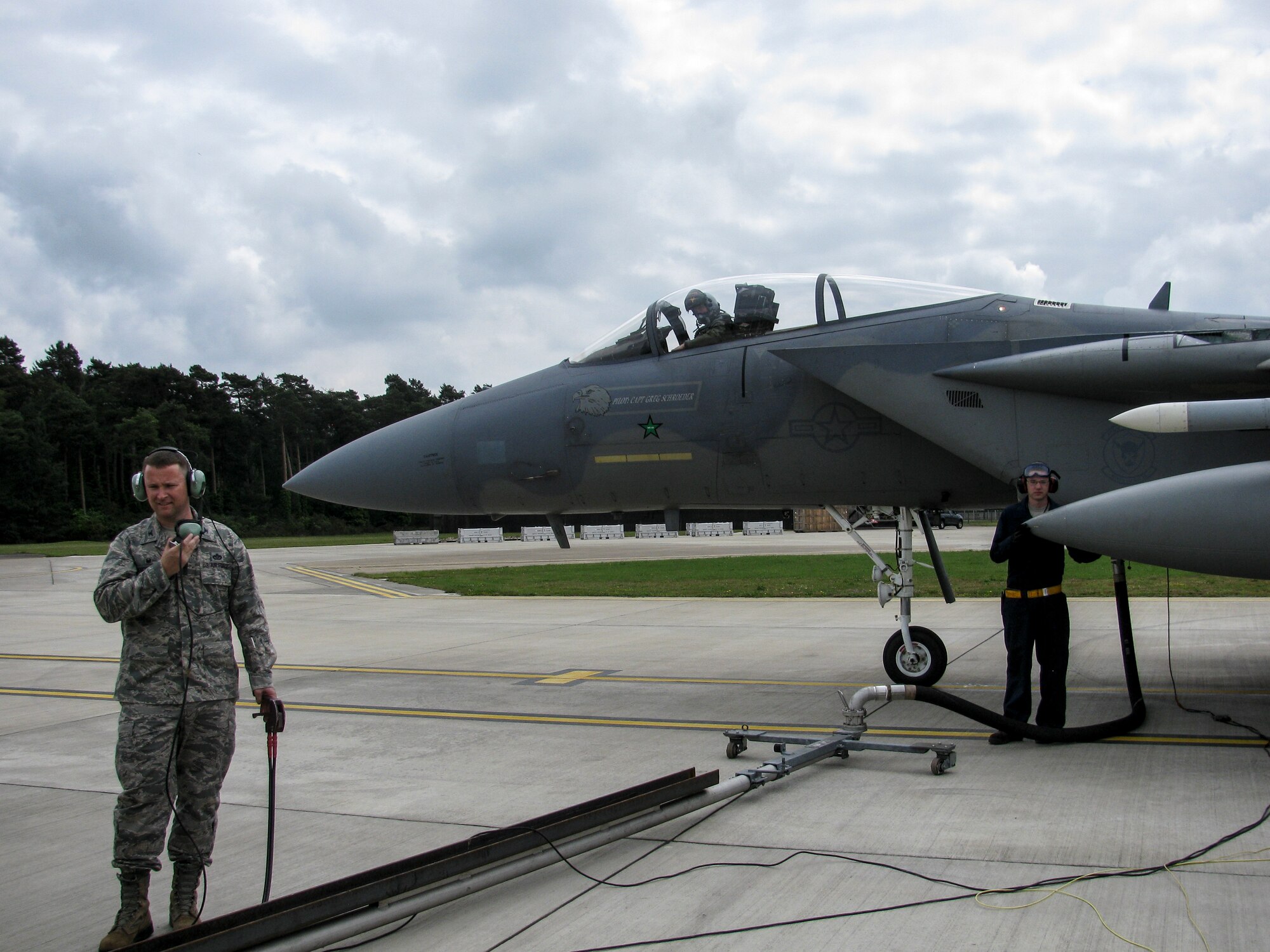 Col. Marc Vandeveer, 48th Mission Support Group commander, tests the 48th Logistics Readiness Squadron’s new hot-pit refueling system on an F-15C Eagle at Royal Air Force Lakenheath, England, May 29, 2014. The new refueling systems now allow for hot-pit refueling on all 48th Fighter Wing jets, which is similar to a stock car making a pit stop in NASCAR. (U.S. Air Force photo by Master Sgt. Michael Clark/Released)