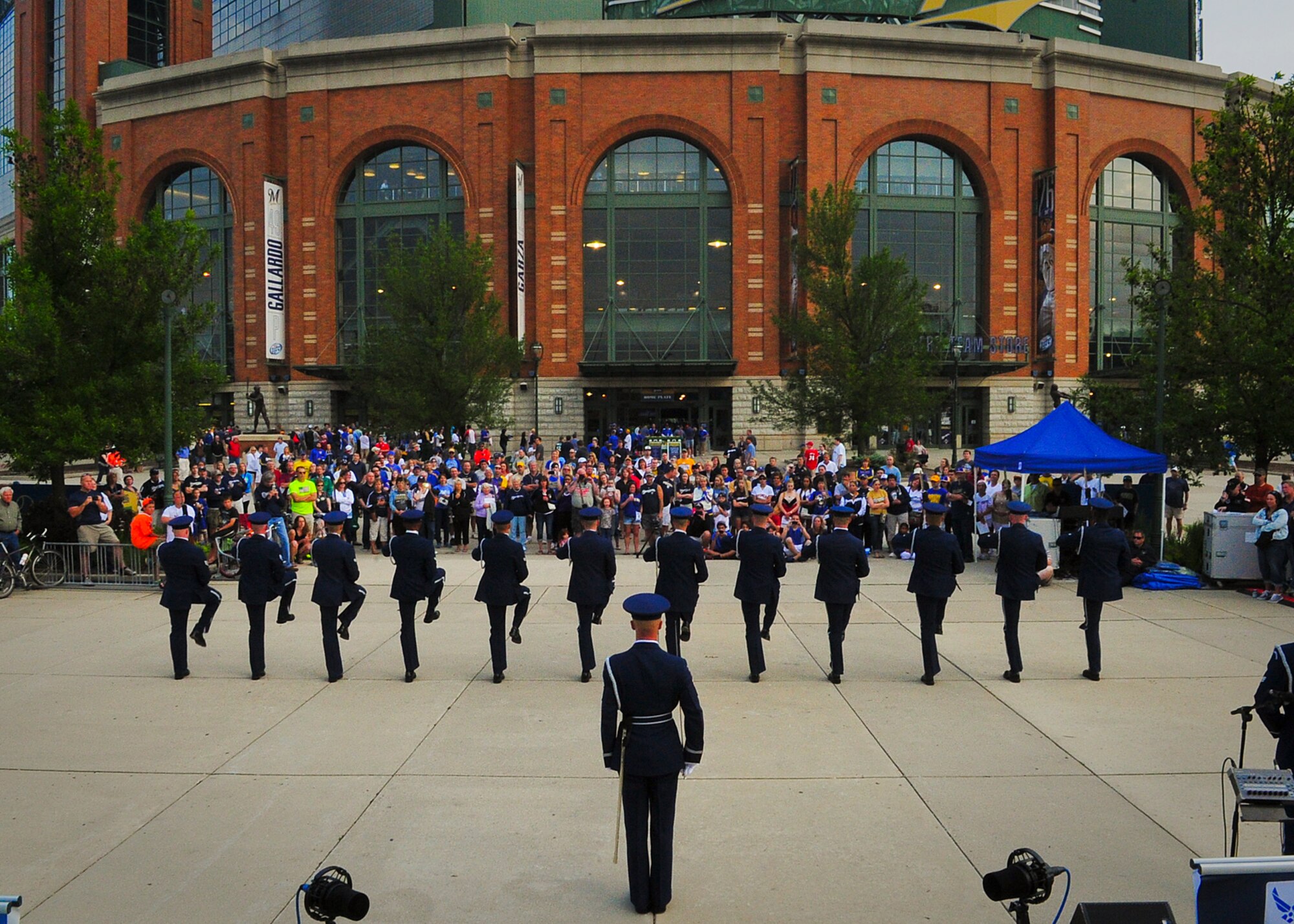 The Airmen of The United States Air Force Honor Guard Drill Team execute a line formation during their performance at Miller Park in Milwaukee, June 23, 2014. The drill team is on a nine-day, seven-city tour with the Air Force band rock ensemble Max Impact across Wisconsin, Minnesota, South Dakota, Wyoming and Nebraska. (U.S. Air Force Photo/ 1st Lt. Nathan Wallin)