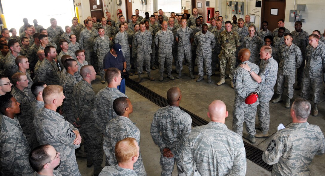 Chief Master Sgt. of the Air Force James Cody introduces Master Sgt. Andre Davis of the Air National Guard’s 203rd RED HORSE Squadron to a group of Airmen assigned to the 5th Combat Communications Group, June 25, 2014. Davis was one of the Air Force’s 12 Outstanding Airmen of the Year for 2013 and accompanied Cody during his tour of Robins Air Force Base. Ga. (U.S. Air Force photo/Senior Master Sgt. Jill LaVoie)