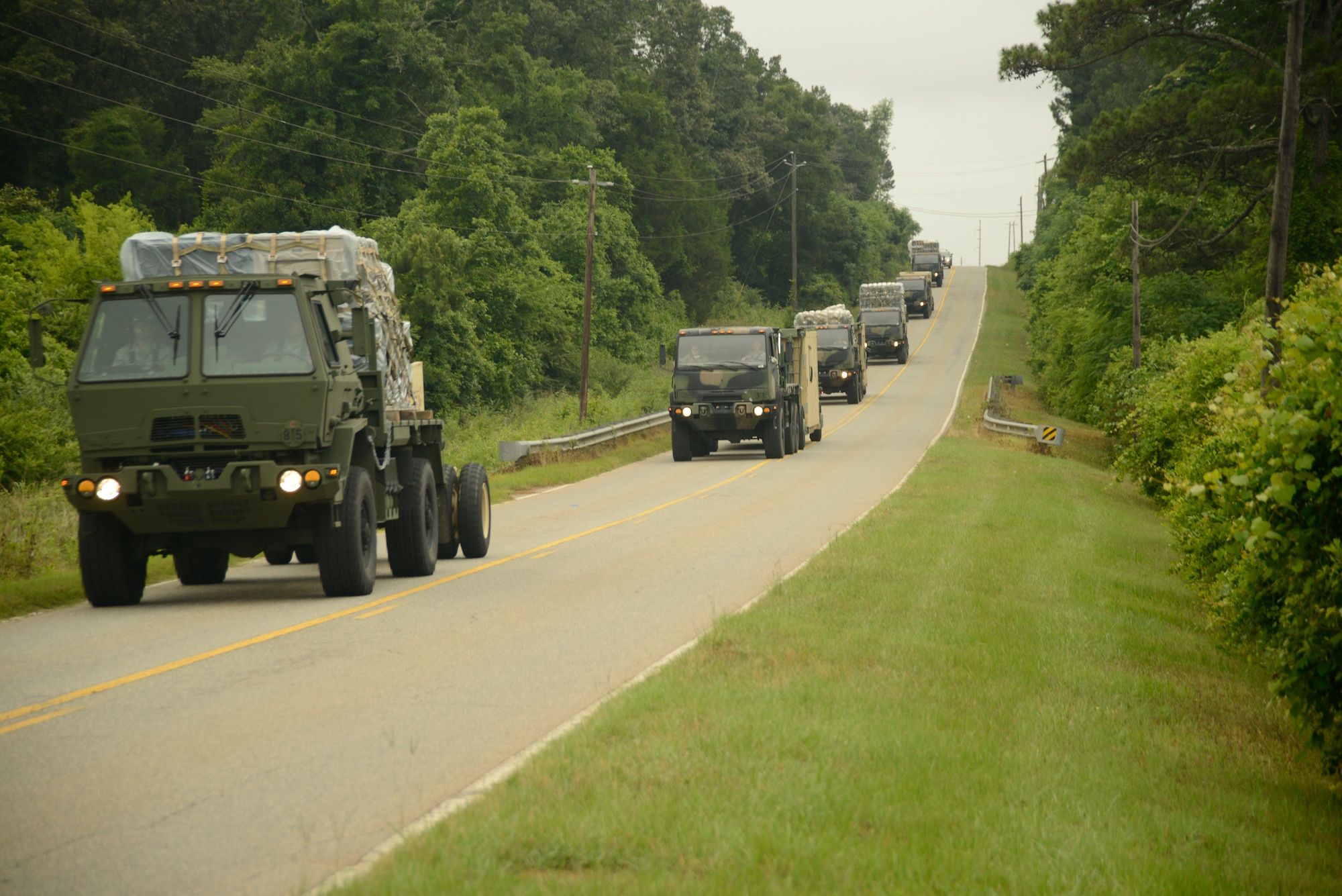 Airmen from the 53rd Combat Communications Squadron convoy to Perry Airfield June 7 as part of an exercise. The 5th Combat Communications Group can deploy to support a diverse range of operations anywhere in the world, providing command and control communications, as well as air traffic control and weather systems