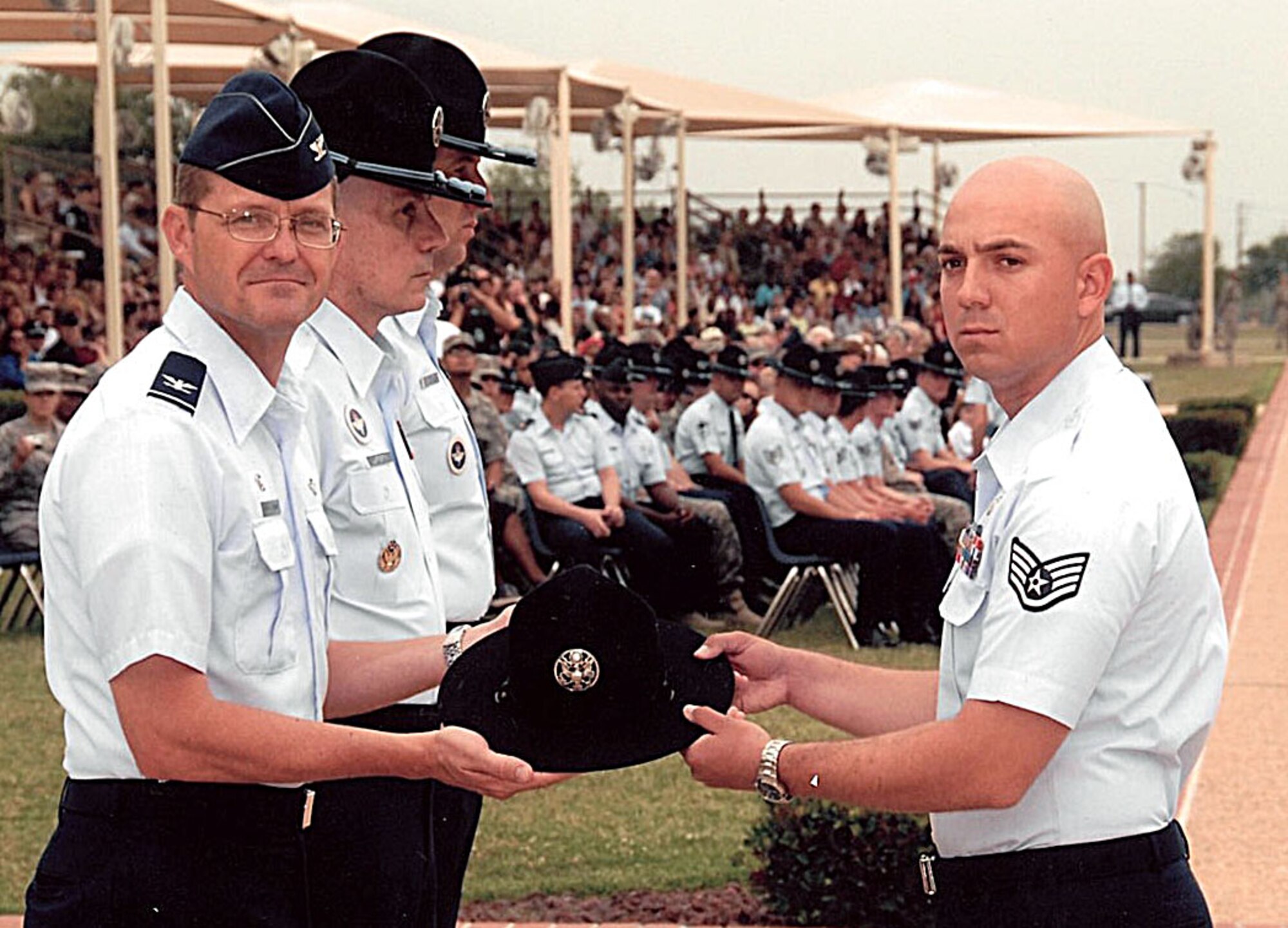 Staff Sgt. Matthew Orlando, 326th Training Squadron basic military training instructor, receives his hat at Lackland Air Force Base, Texas. Orlando was an MTI for Air Force BMT from 2009 to 2013. (courtesy photo)