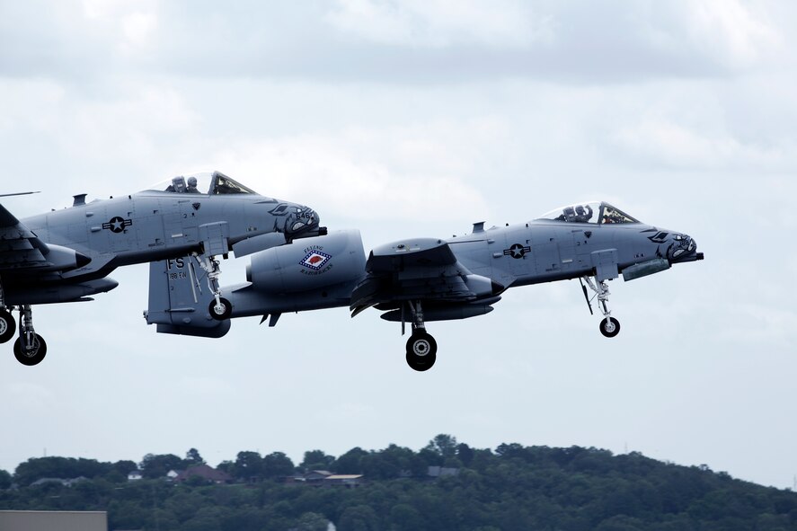 Two 188th Wing A-10C Thunderbolt II “Warthogs” piloted by Col. Mark Anderson, 188th Wing commander, and Maj. Doug Davis, 188th Detachment 1 commander, take off from Ebbing Air National Guard Base, Fort Smith, Arkansas, June 7, 2014. This sortie marked the wing’s final A-10 departure and capped the 188th’s Conversion Day ceremony, which recognized the many changes occurring at the wing as a result of its conversion to a remotely piloted aircraft (MQ-9 Reapers) and intelligence, surveillance and reconnaissance mission. The 188th Fighter Wing was also redesignated as the 188th Wing during the event. (U.S. Air National Guard photo by Master Sgt. Mark Moore)