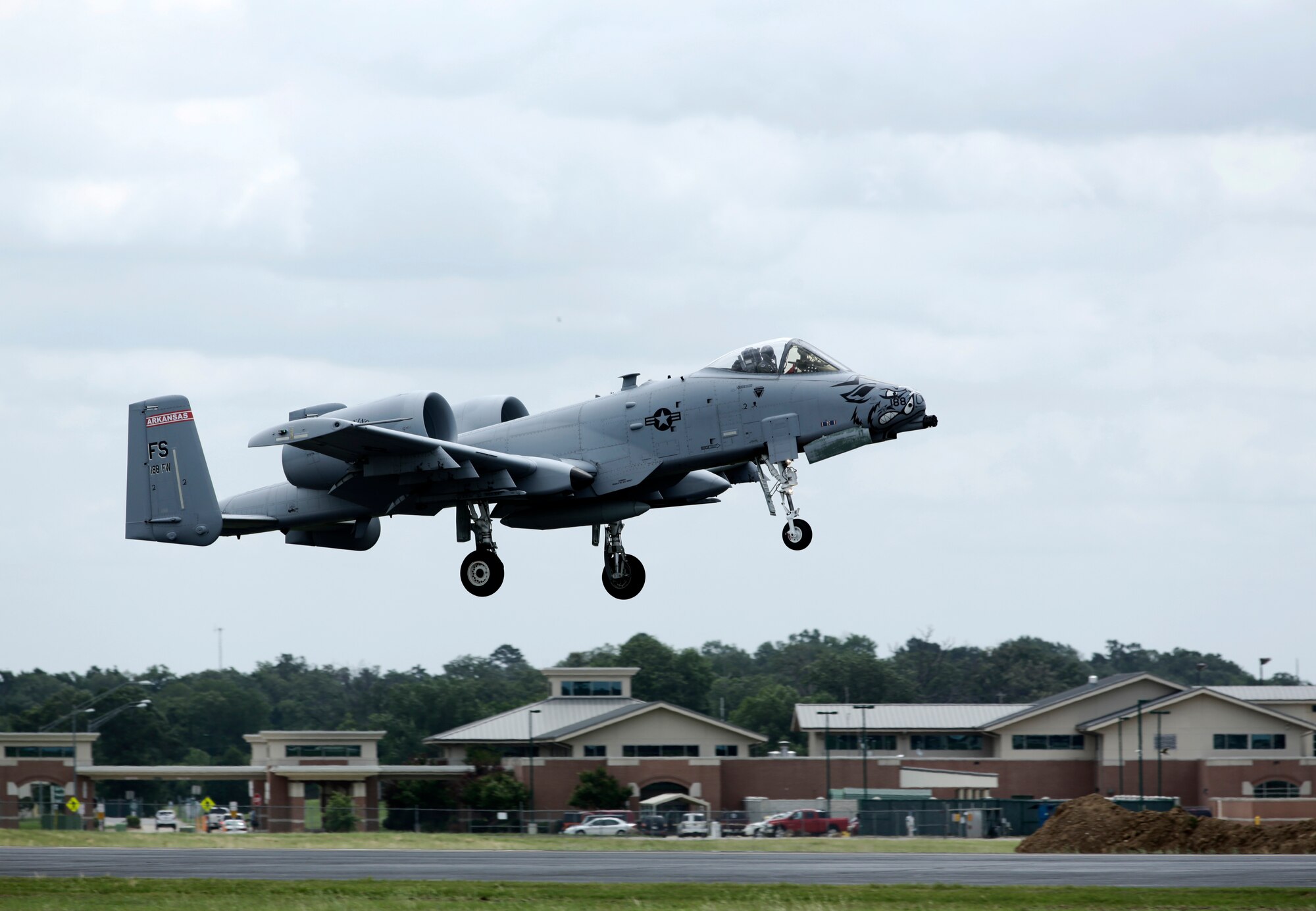 Two 188th Wing A-10C Thunderbolt II “Warthogs” piloted by Col. Mark Anderson, 188th Wing commander, and Maj. Doug Davis, 188th Detachment 1 commander, take off from Ebbing Air National Guard Base, Fort Smith, Arkansas, June 7, 2014. This sortie marked the wing’s final A-10 departure and capped the 188th’s Conversion Day ceremony, which recognized the many changes occurring at the wing as a result of its conversion to a remotely piloted aircraft (MQ-9 Reapers) and intelligence, surveillance and reconnaissance mission. The 188th Fighter Wing was also redesignated as the 188th Wing during the event. (U.S. Air National Guard photo by Master Sgt. Mark Moore)