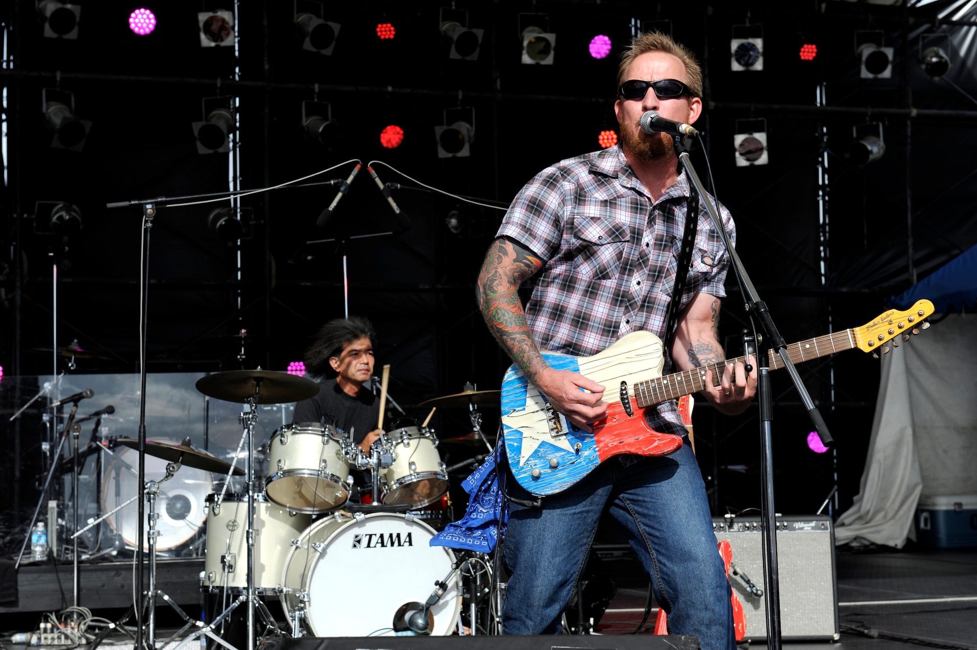 Clint Walker and the Groove Cats perform during AmericaFest 2014 on Kadena Air Base, Japan, June 28, 2014. The two-day event is designed to build a positive relationship between U.S. military forces on Okinawa and the local population in a fun and informal environment, while offering a first-hand look at a traditional Fourth of July celebration. (U.S. Air Force photo by Senior Airman Maeson L. Elleman)