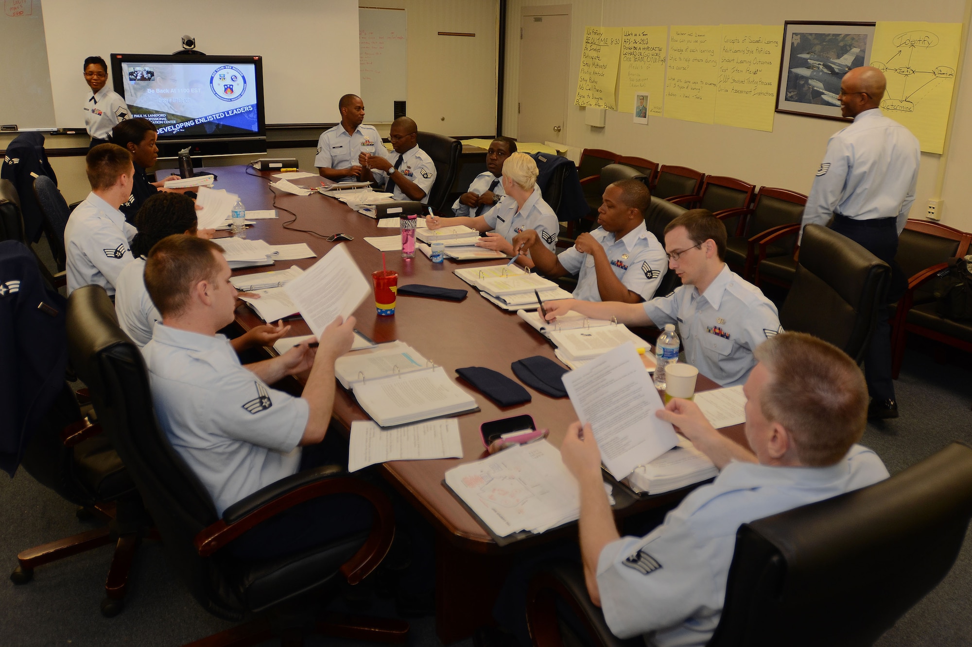 Students prepare for class in an Airman Leadership School course at McEntire Joint National Guard Base, S.C. May 31, 2014.  The 169th Fighter Wing distance-learning ALS course prepares Swampfox Airmen for excellence in supervisory roles and responsibilities. (U.S. Air National Guard photo by Airman 1st Class Ashleigh S. Pavelek/Released)